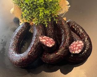 Black-smoked black pudding ring